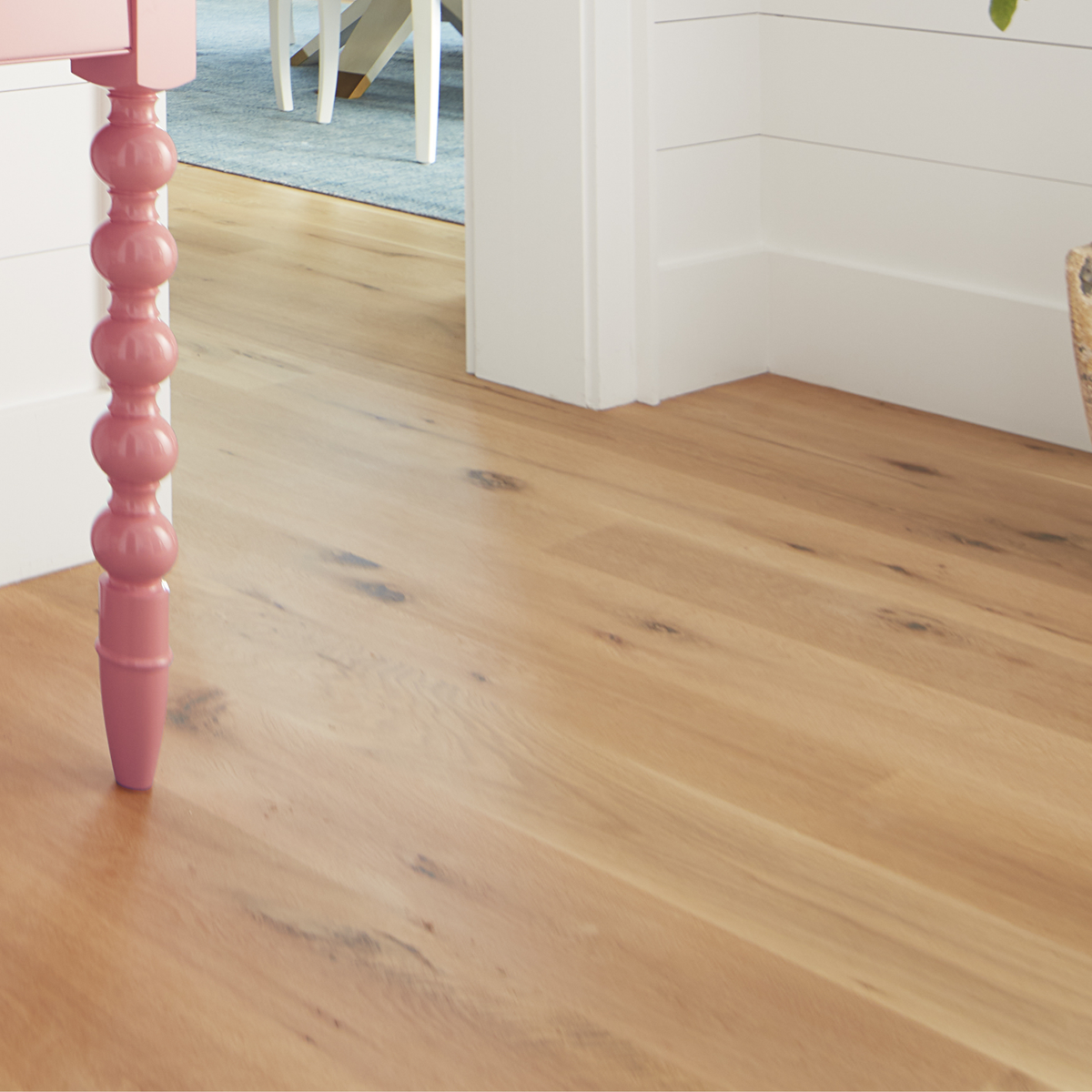 A wooden floor painted with Benjamin Moore Stays Clear Varnish