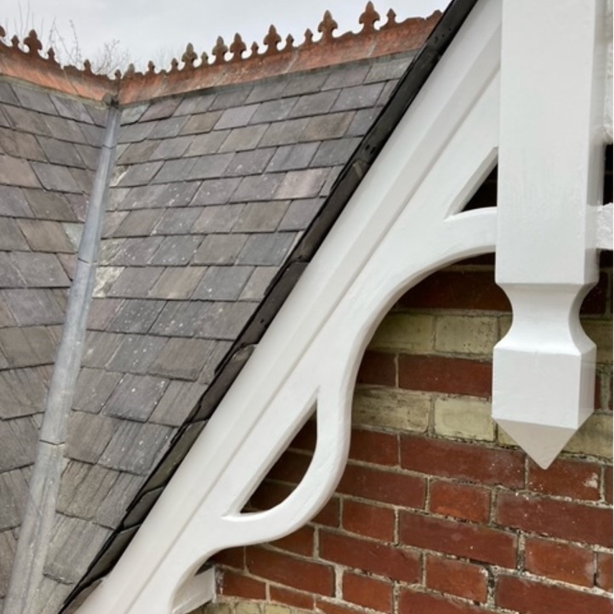 Gable end repaired with Timbabuild EHB60 wood repair resin and painted white.