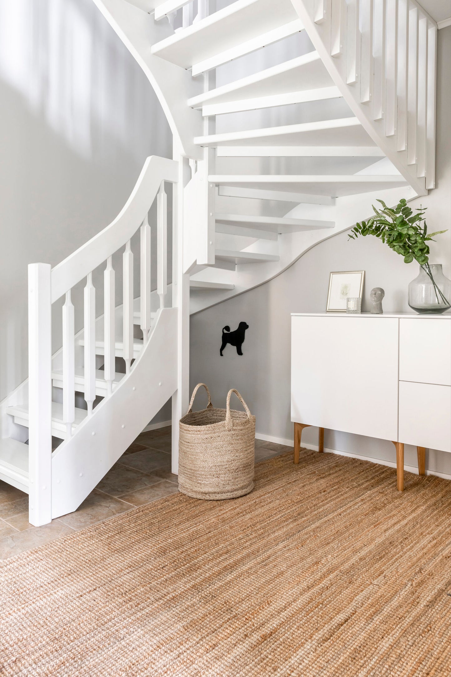 A wooden staircase painted white in Teknos Futura Aqua wood and metal paint