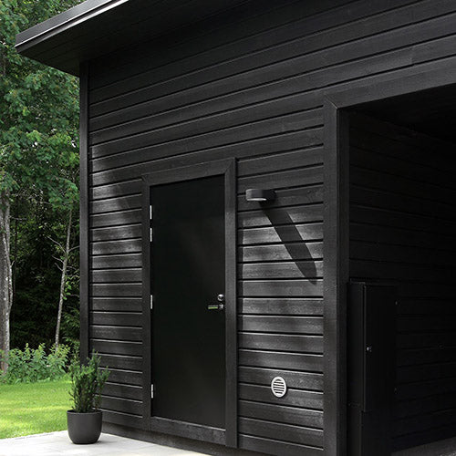 A wooden cladding building painted in Nordica Classic Matt