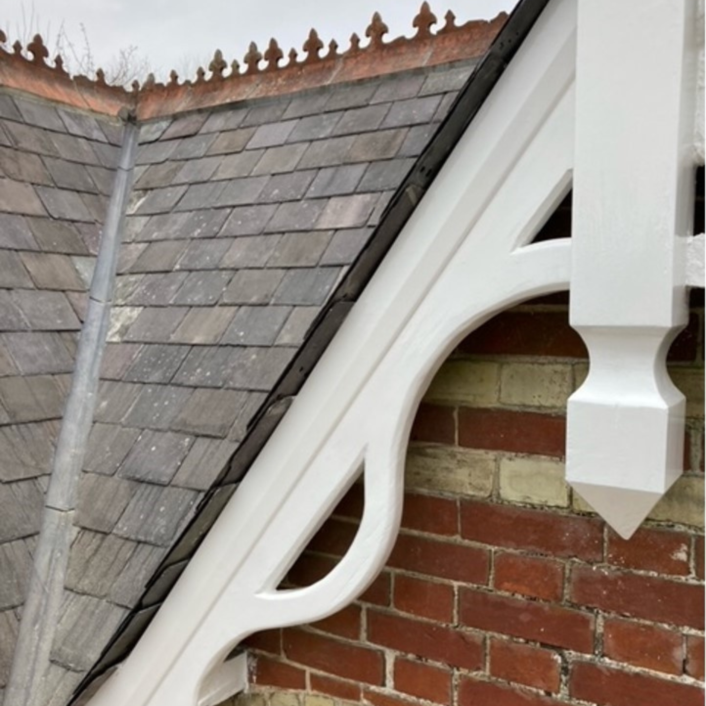 Gable end repaired with Timbabuild EHB60 wood repair resin and painted white.